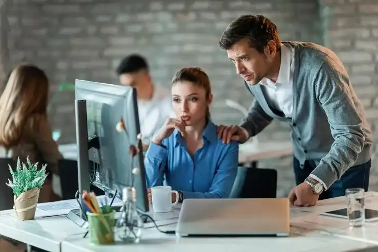 two entrepreneurs working office analyzing business plans computer focus is man 637285 1071 compressed